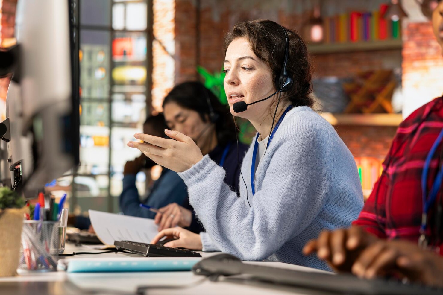 call-center-operator-coworkers-dealing-with-upset-customers_482257-117868